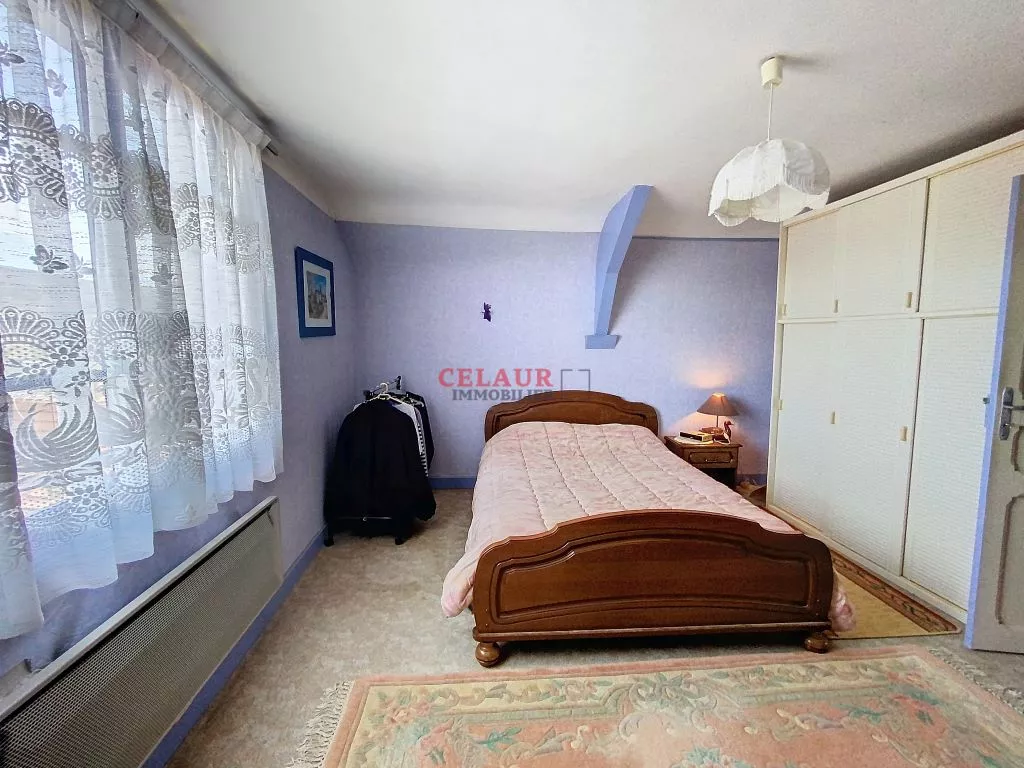 MAISON DE VILLE AVEC TERRASSE ET JARDIN