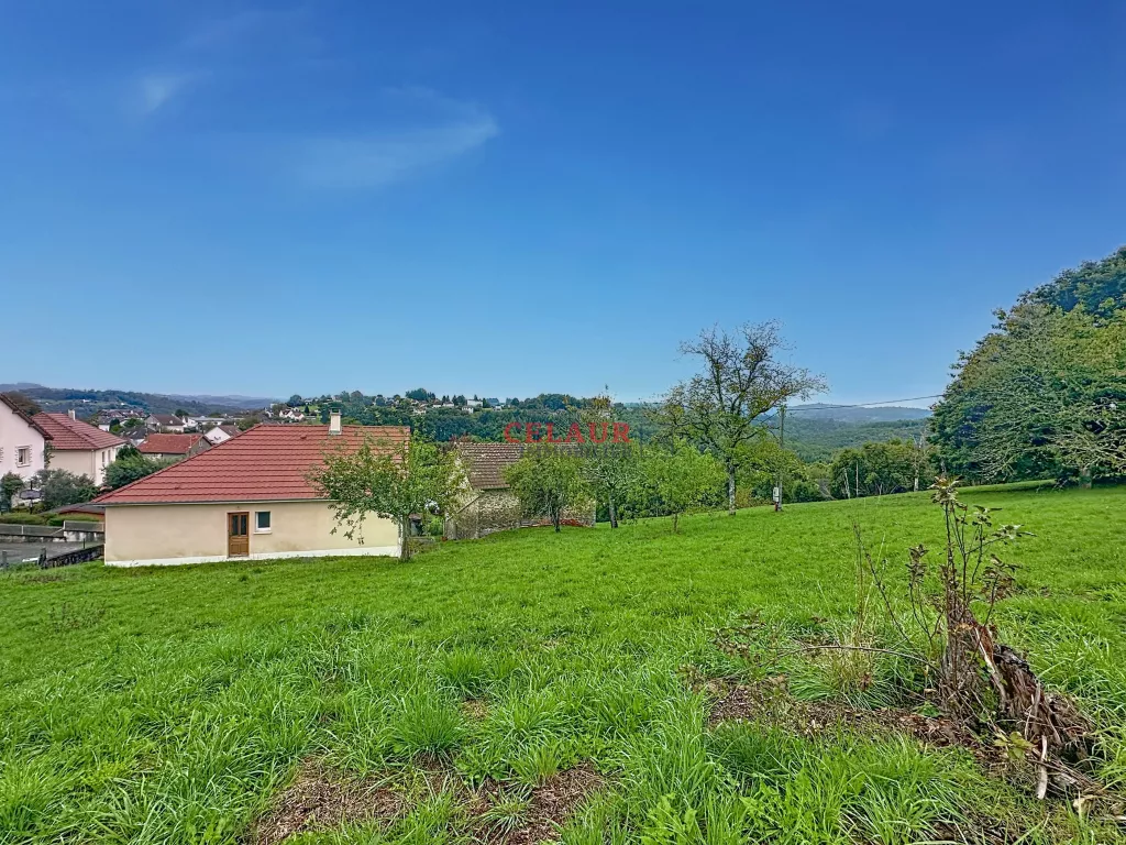 Maison en pierre avec grange