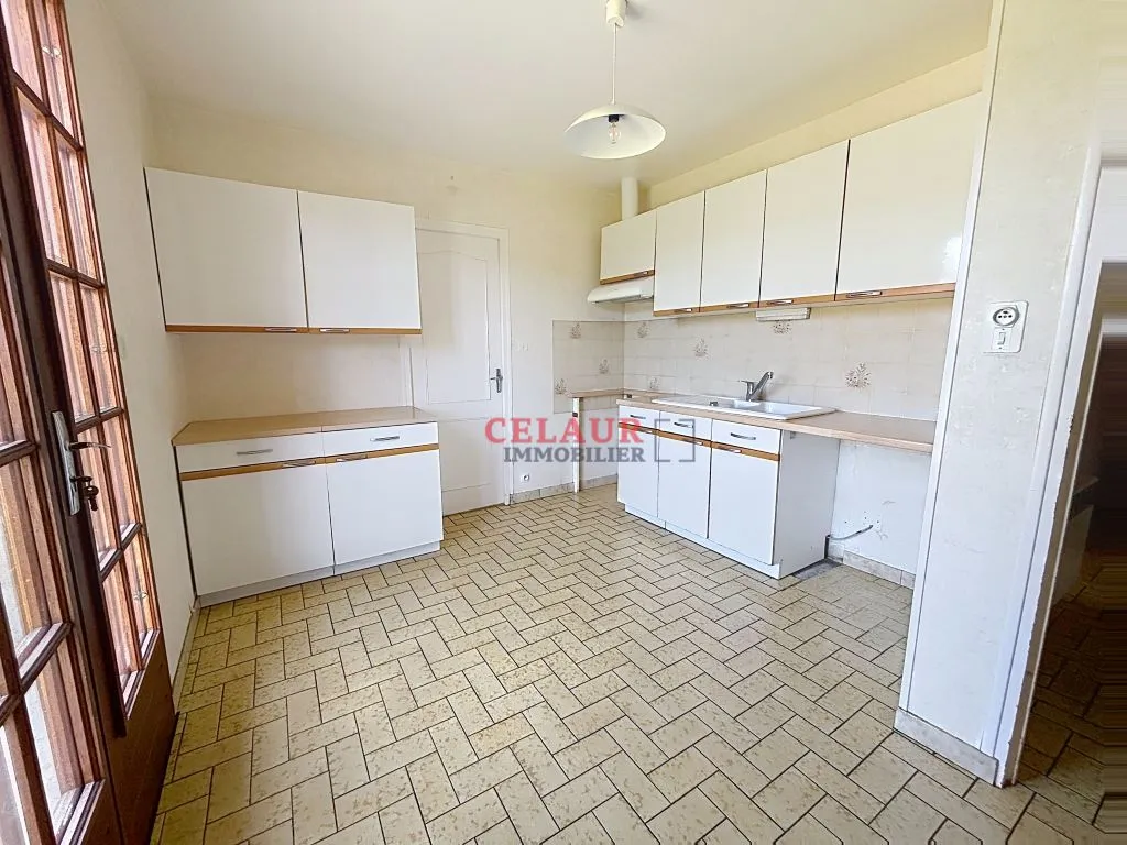 MAISON SUR SOUS-SOL SUR 1500 M&sup2; DE JARDIN A 5 MN DES COMMERCES